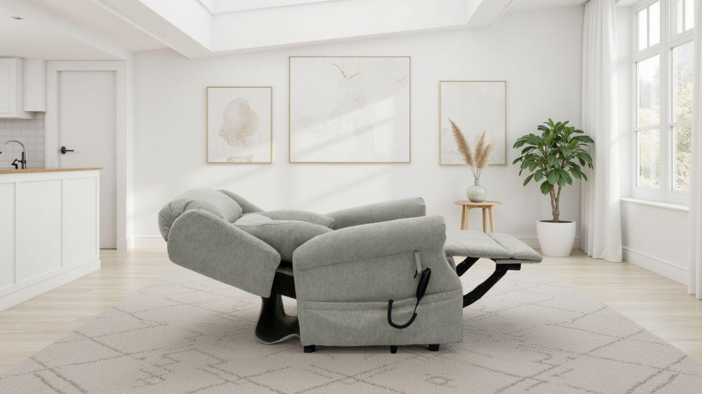 Beige recliner in a modern living room with white walls and a plant.